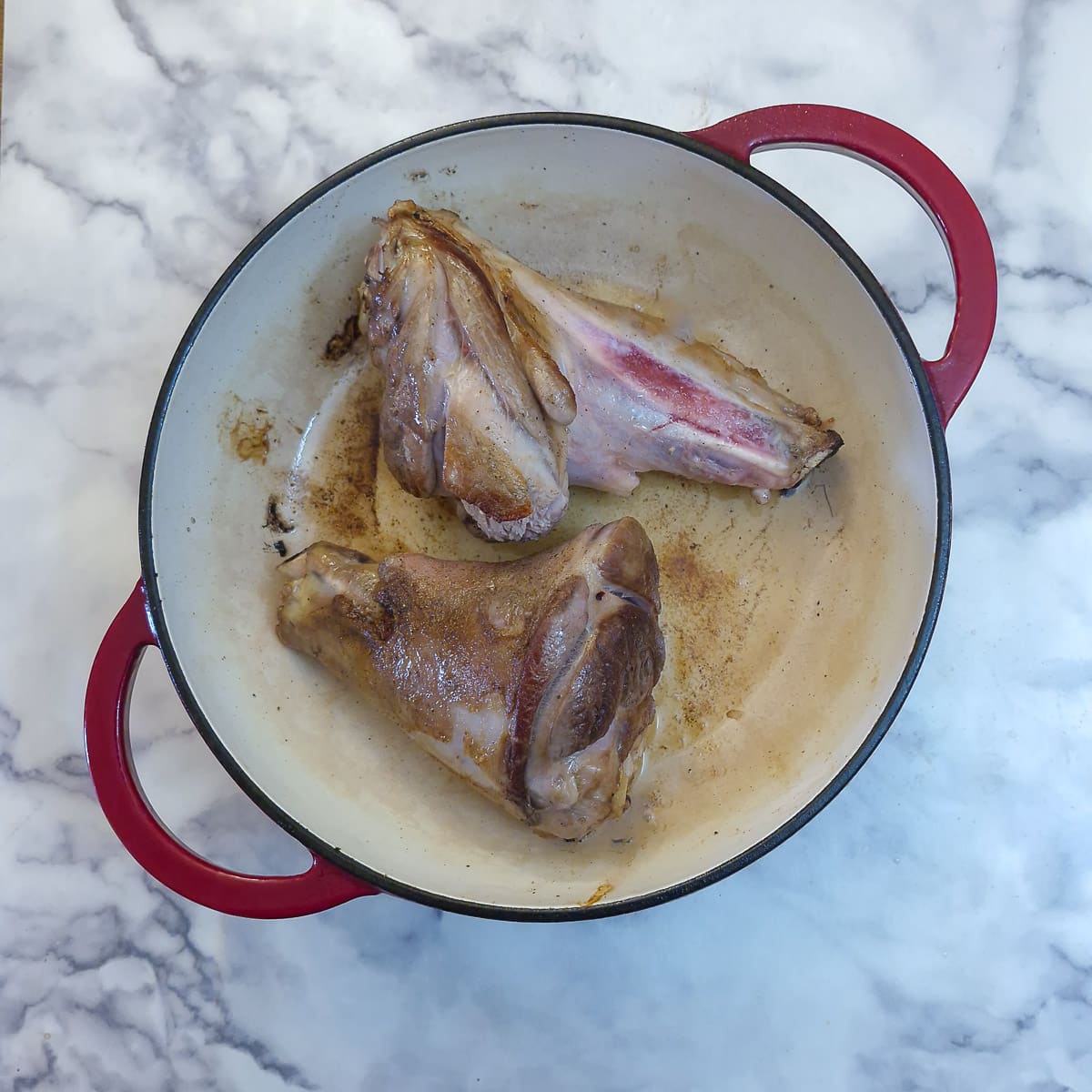 Step 1 - brown the lamb shanks in a splash of oil in a pan.