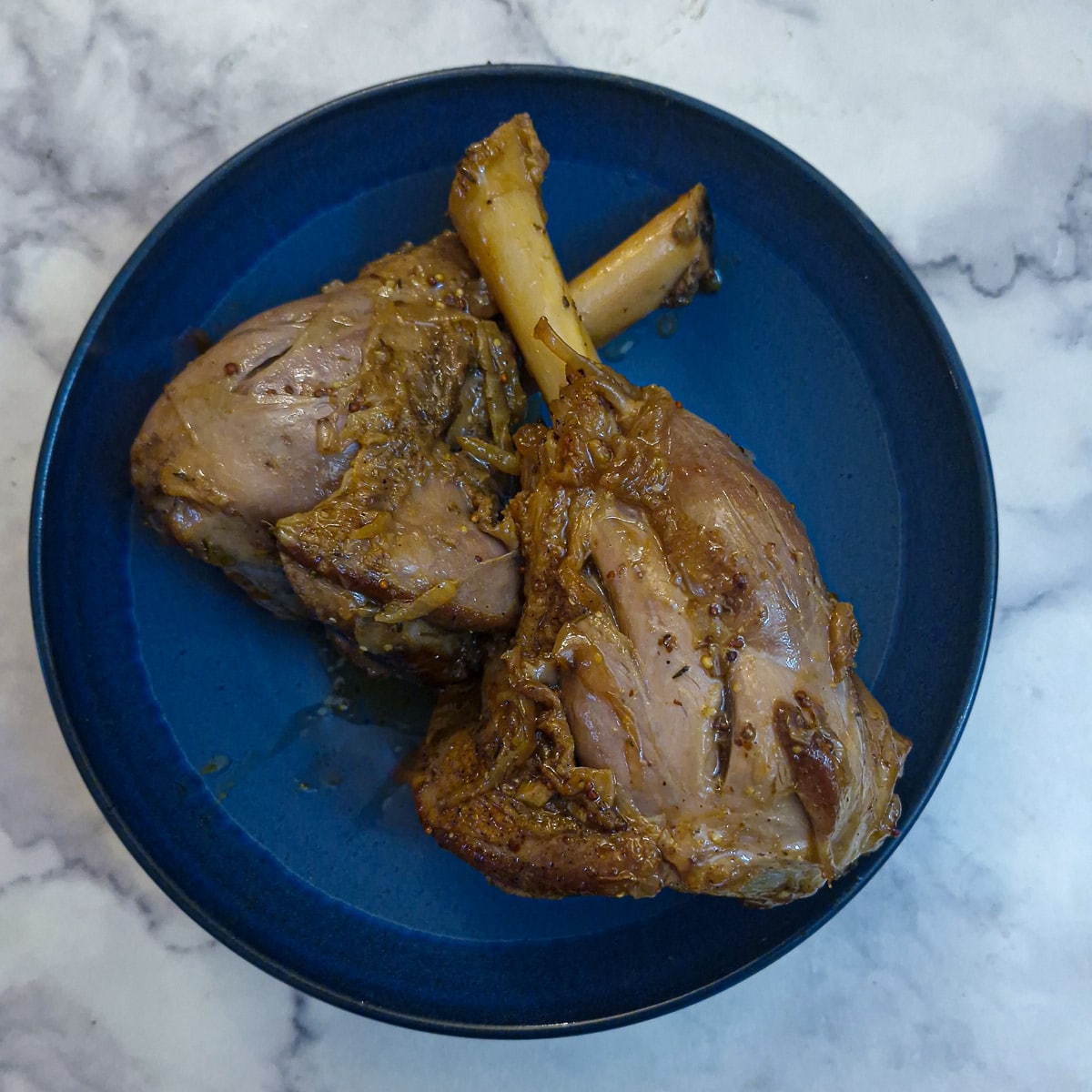 Step 5 - removed the cooked lamb shanks to a plate.
