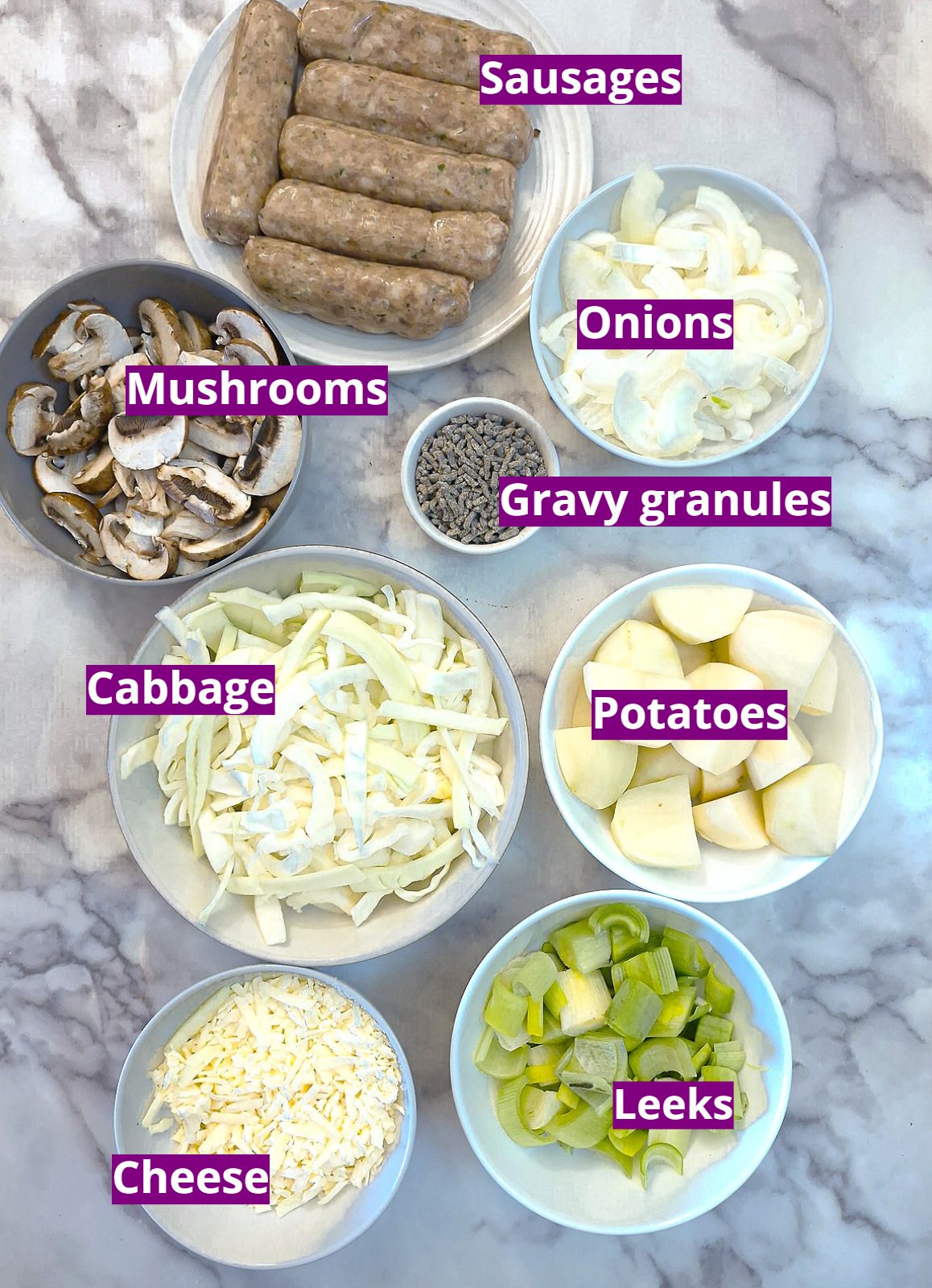 Ingredients needed to make a sausage and onion bake with colcannon topping.