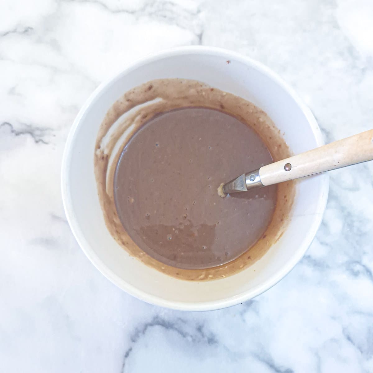 Melted chocolate and cream stirred together until smooth.