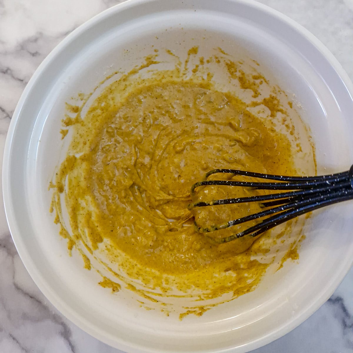 Step 3. The batter combined with extra water to a thin coating consistency.