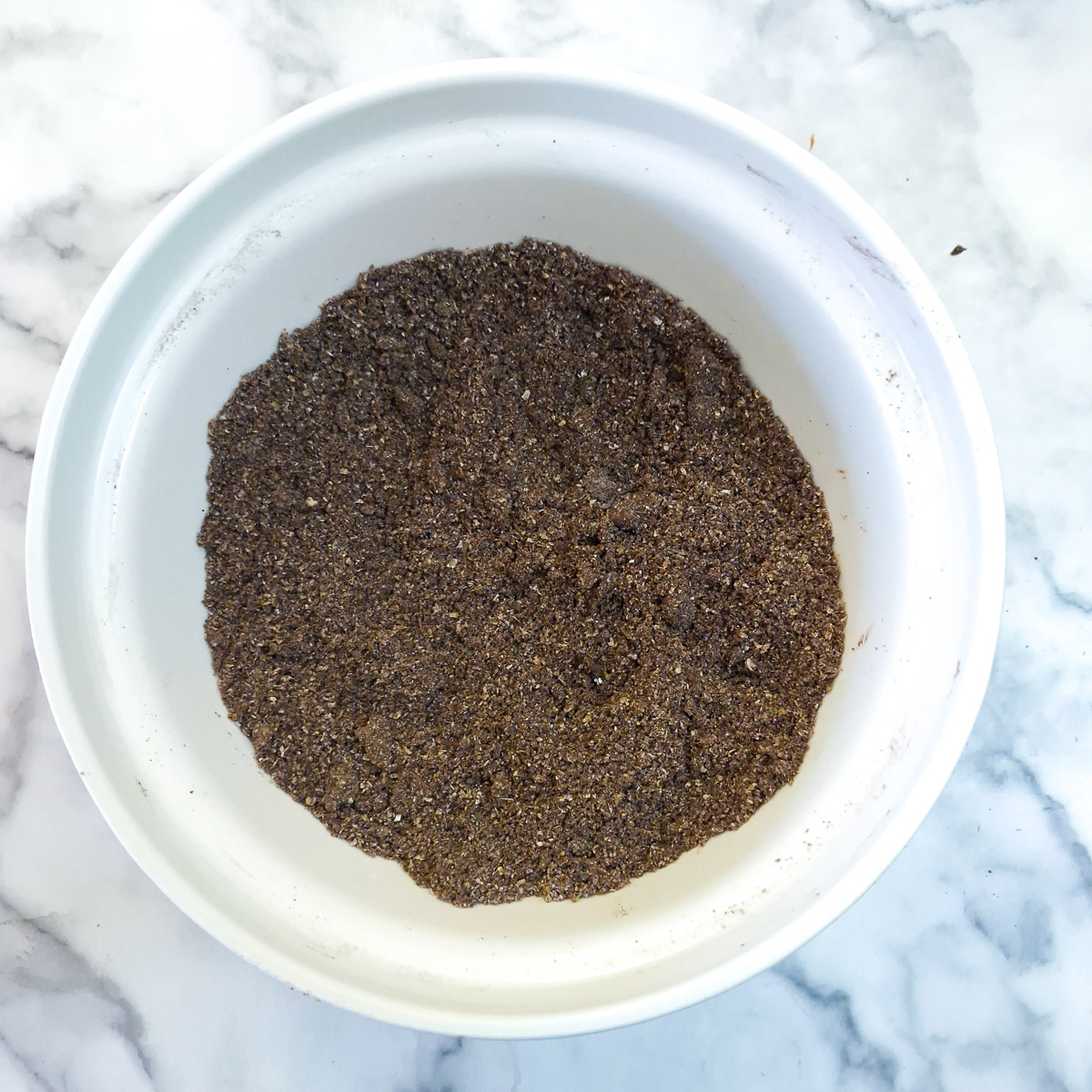 Margarine rubbed into the dry ingredients until they resemble coarse sand or breadcrumbs.