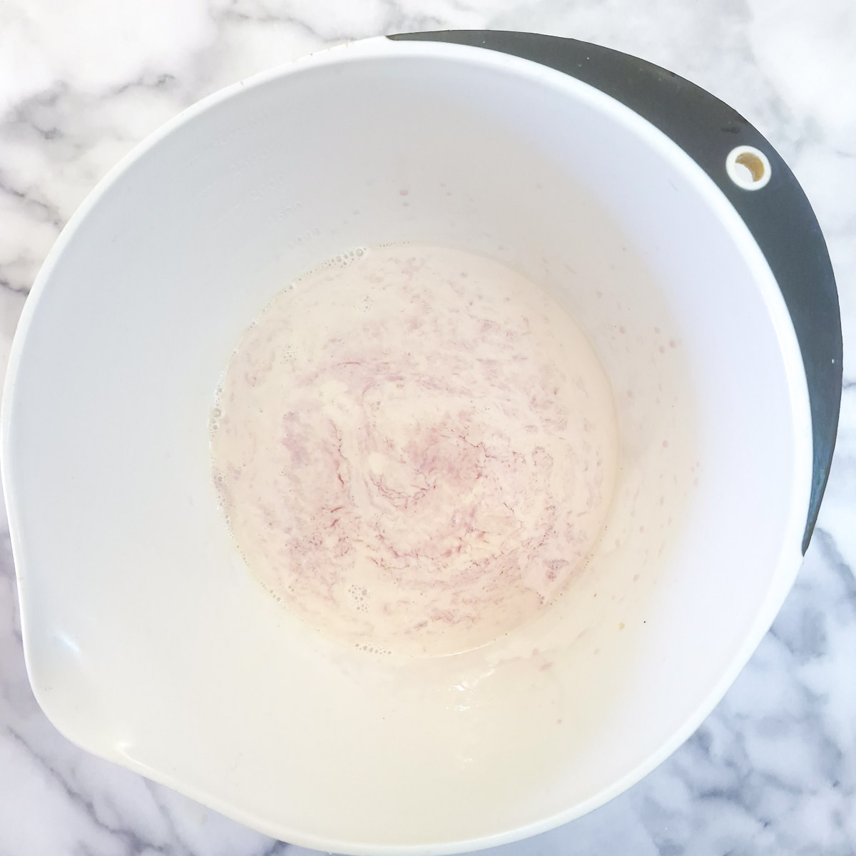 Step 4 - evaporated milk and jelly in a mixing bowl.