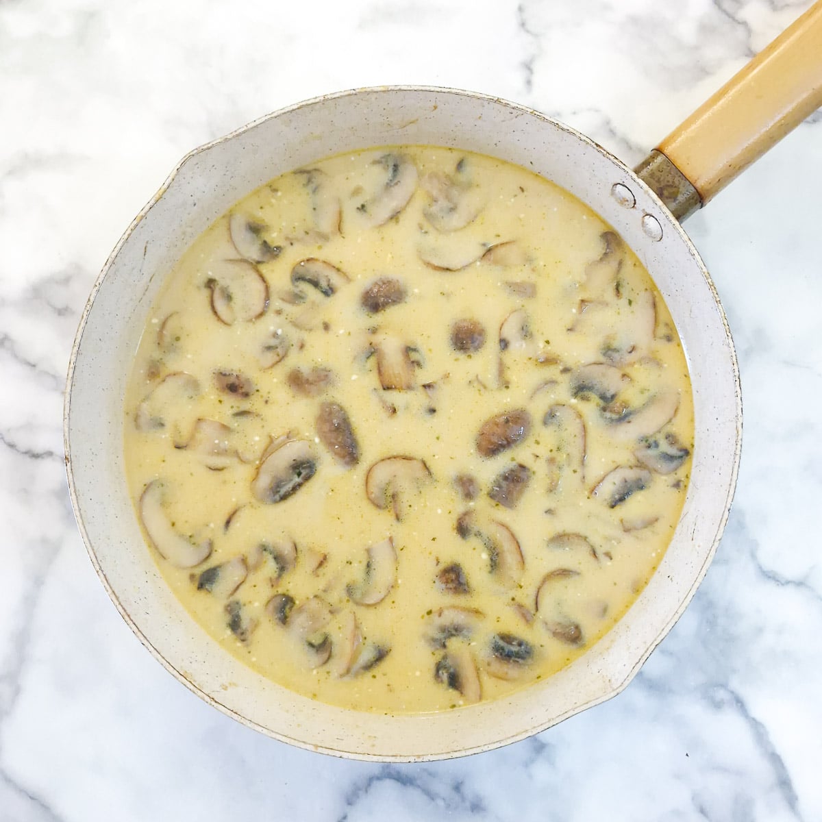 Step 5 - stock, marsala and cream stirred into the mushrooms.