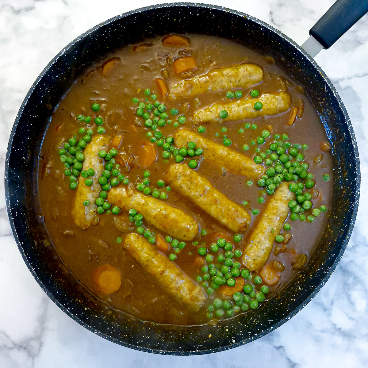 Step 8 - frozen peas added and allowed to heat through.