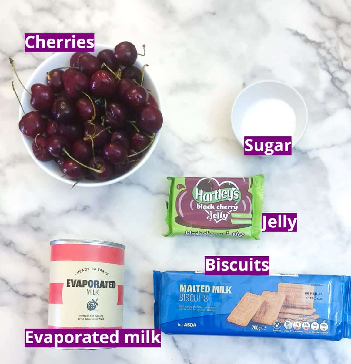 Ingredients for a milk jelly cherry dessert.