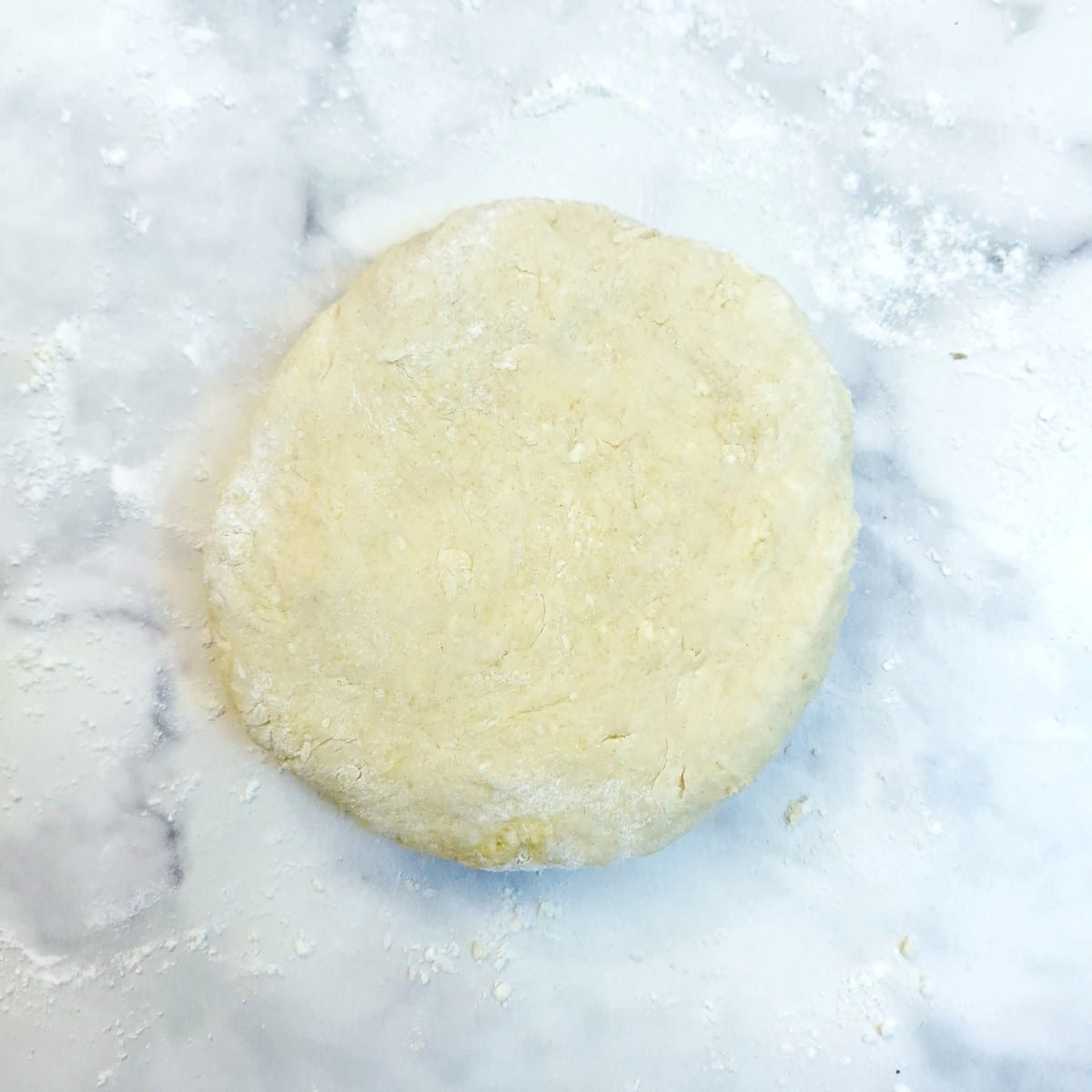 Step 3 - A smooth ball of dough on a table ready to chill in the refrigerator.