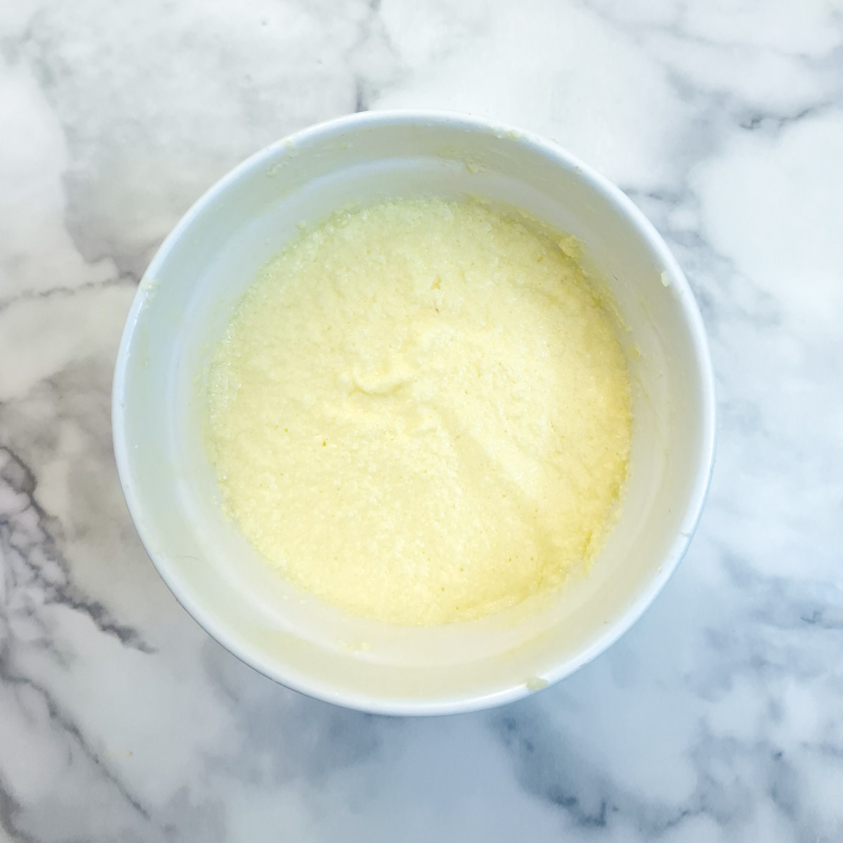 Step 9 - 3 eggs have been beaten into the sugar and butter mixture.