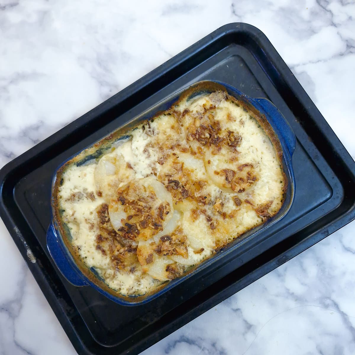Step 8 - a nicely browned potato bake after being in the overn uncovered for 15 minutes.