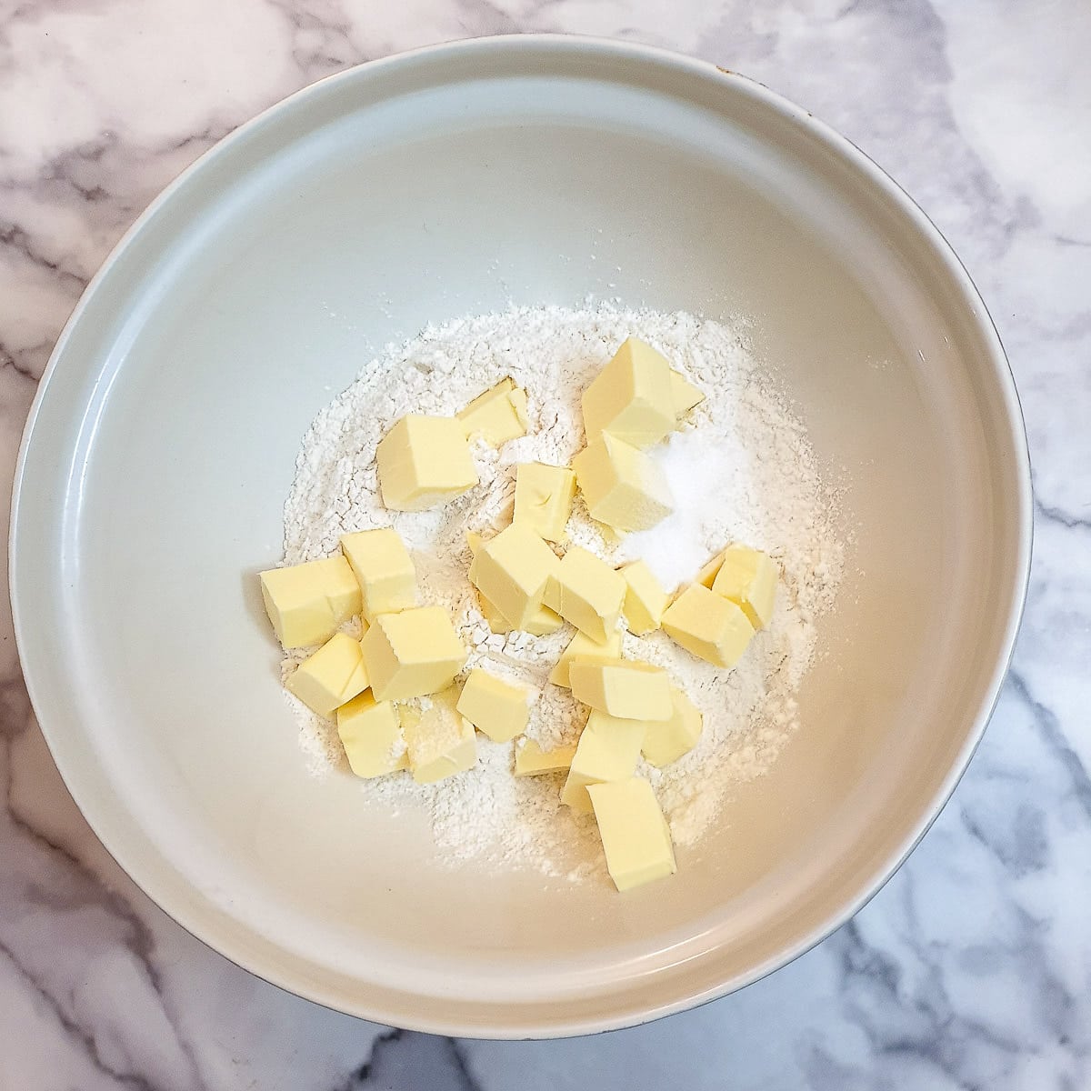 Step 1 - cubed butter and flour and salt in a mxing bowl.