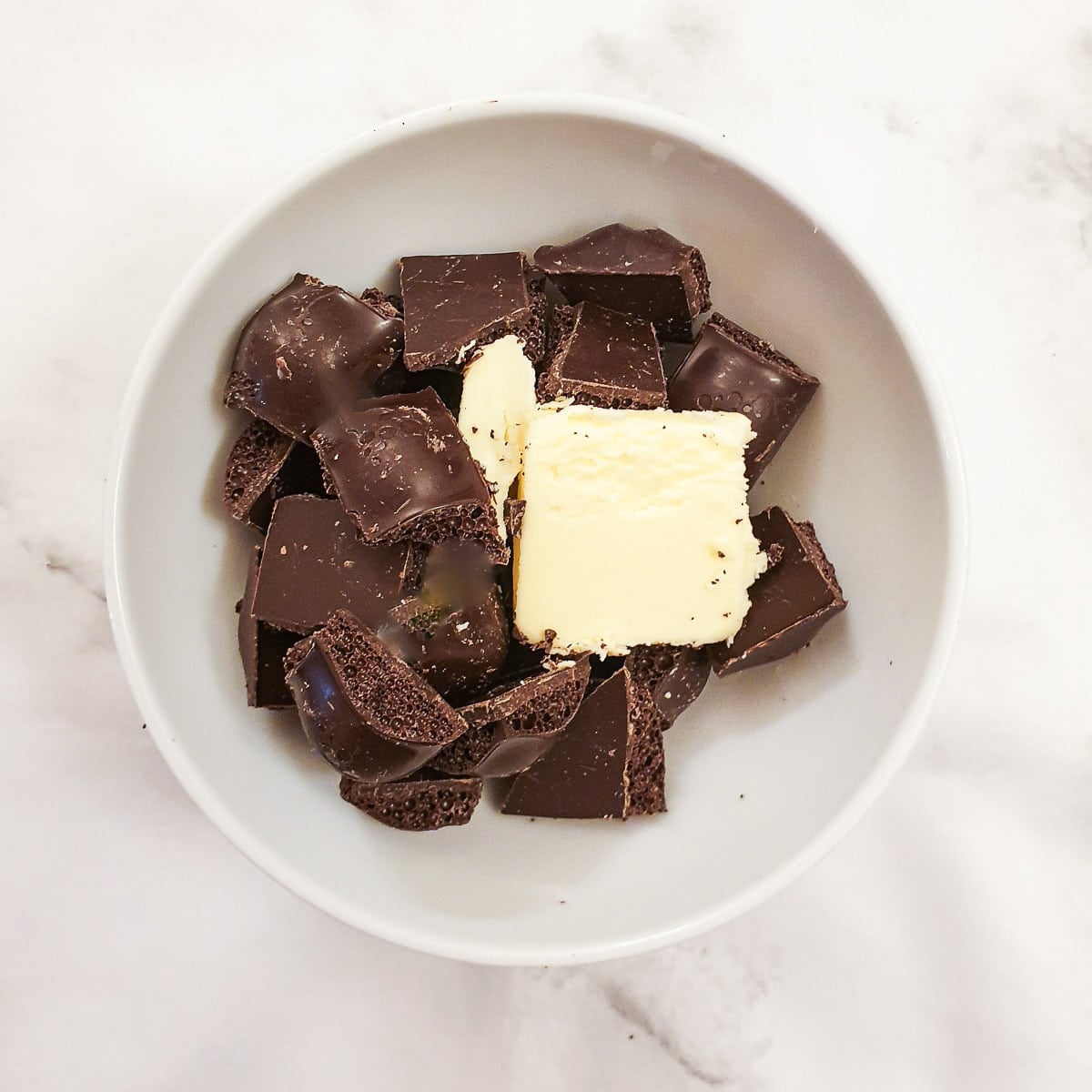 Step 1 - chocolate pieces and butter in a small bowl.