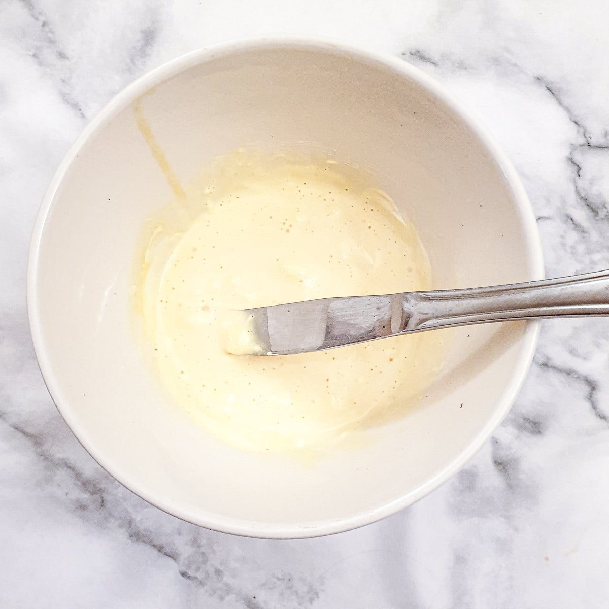Step 7 - egg yolks and mint liqueur combined with the whipped cream.