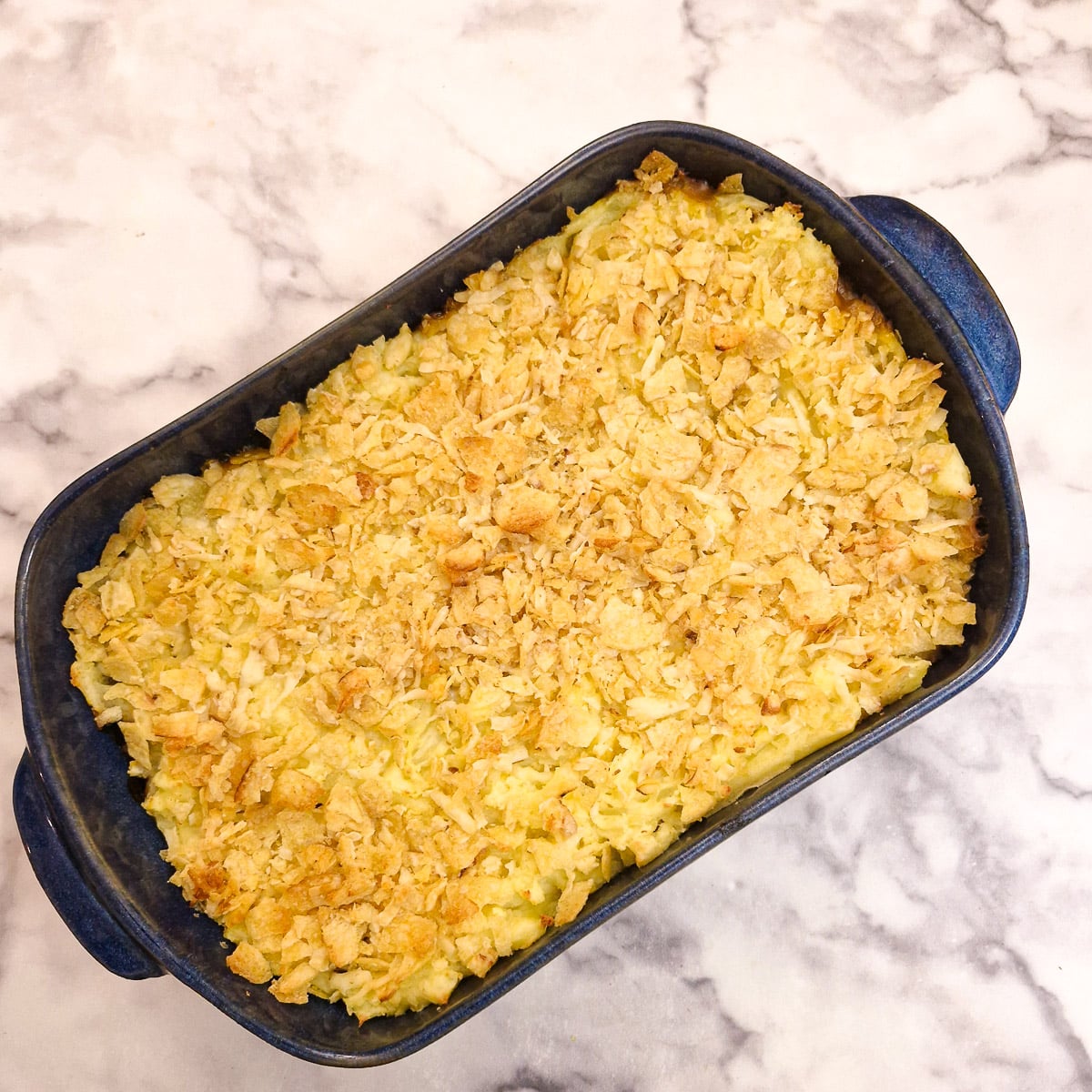 Step 12 - the baked ground beef and mushroom casserole with a golden crispy topping.