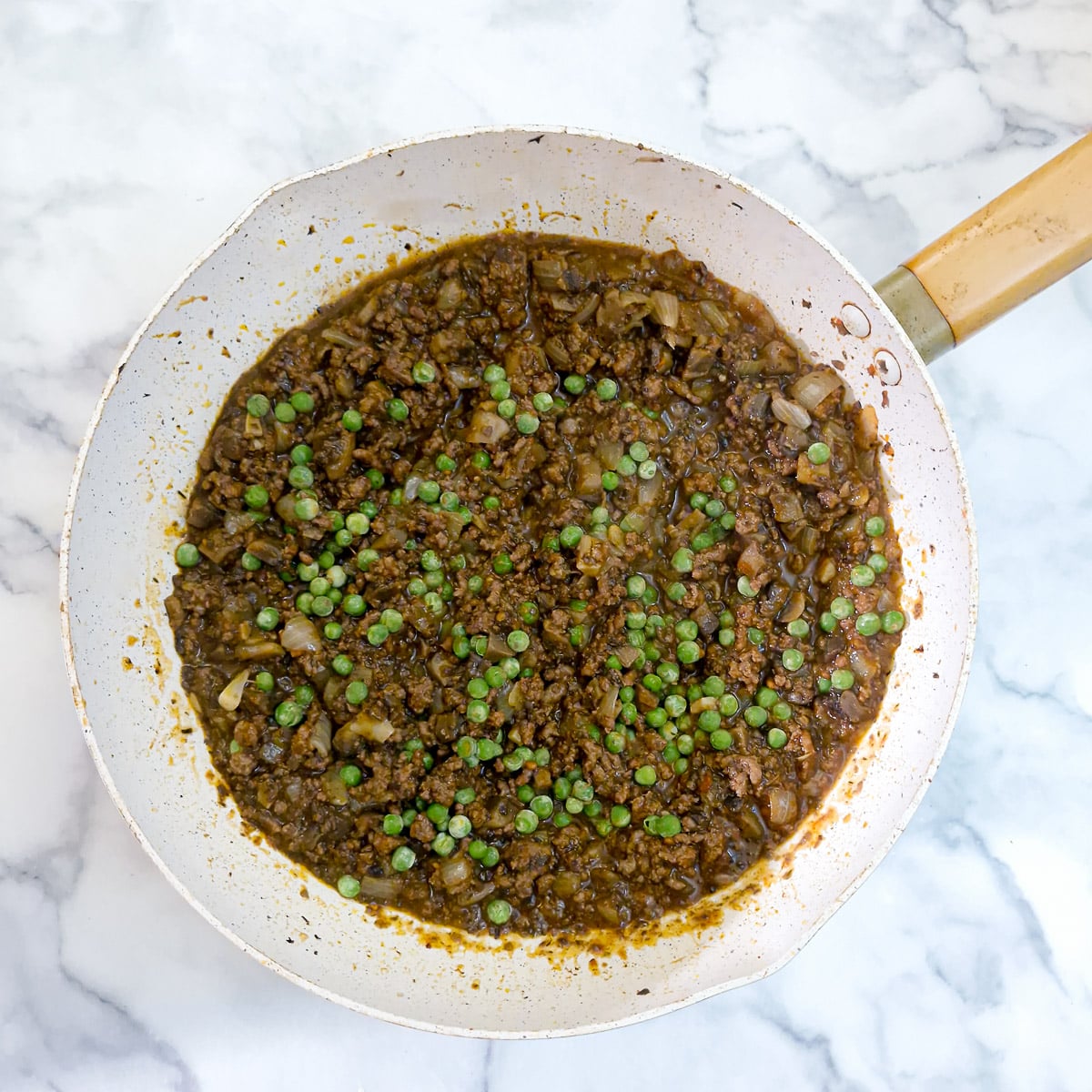 Step 7 - peas added to the filling.